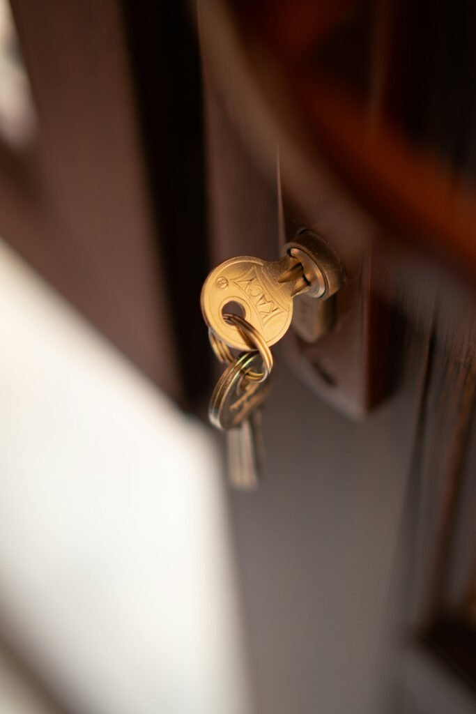 House key in a front door lock – residential locksmith services